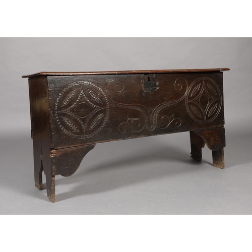 273 - A LATE 17TH CENTURY OAK JOINED CHEST, having a twin plank top with moulded and lined rim, the front ... 