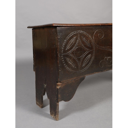 273 - A LATE 17TH CENTURY OAK JOINED CHEST, having a twin plank top with moulded and lined rim, the front ... 