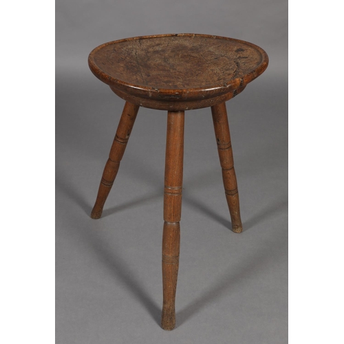 274 - AN 18TH CENTURY SWISS FRUITWOOD CHEESE TABLE, dished circular top, on three turned legs, 48.5cm diam... 