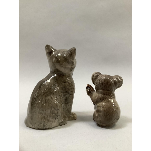 28 - A Beswick grey cat sitting, printed mark, 10cm, a koala bear, printed mark, 6cm, and a Beswick bisqu... 