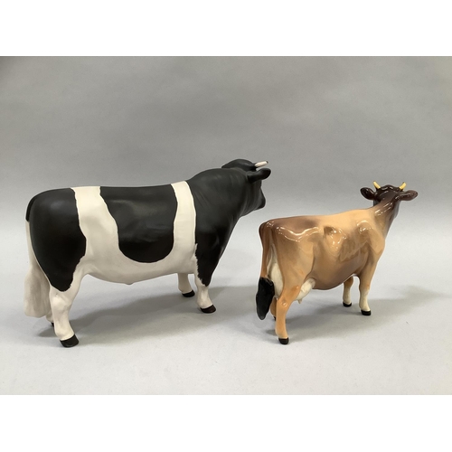 31 - A Beswick Friesian cow 'Champion Coddington Hiltbar', printed mark and title, 12.5cm, together with ... 