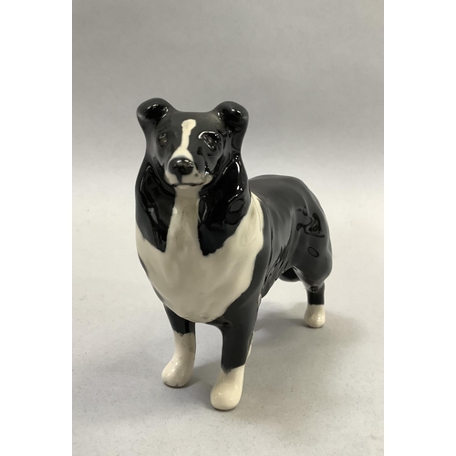 33 - A Beswick model of a donkey, a calf, a Collie dog, and a Jack Russell, the donkey, 11cm high, and a ... 