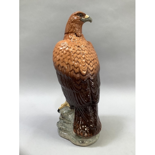 34 - A Beswick Golden Eagle decanter for Gleneagles Scotch whiskey, a liqueur bottle modelled by J G Tong... 
