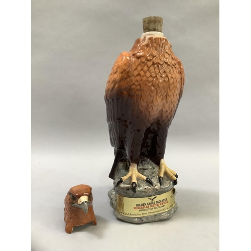 34 - A Beswick Golden Eagle decanter for Gleneagles Scotch whiskey, a liqueur bottle modelled by J G Tong... 