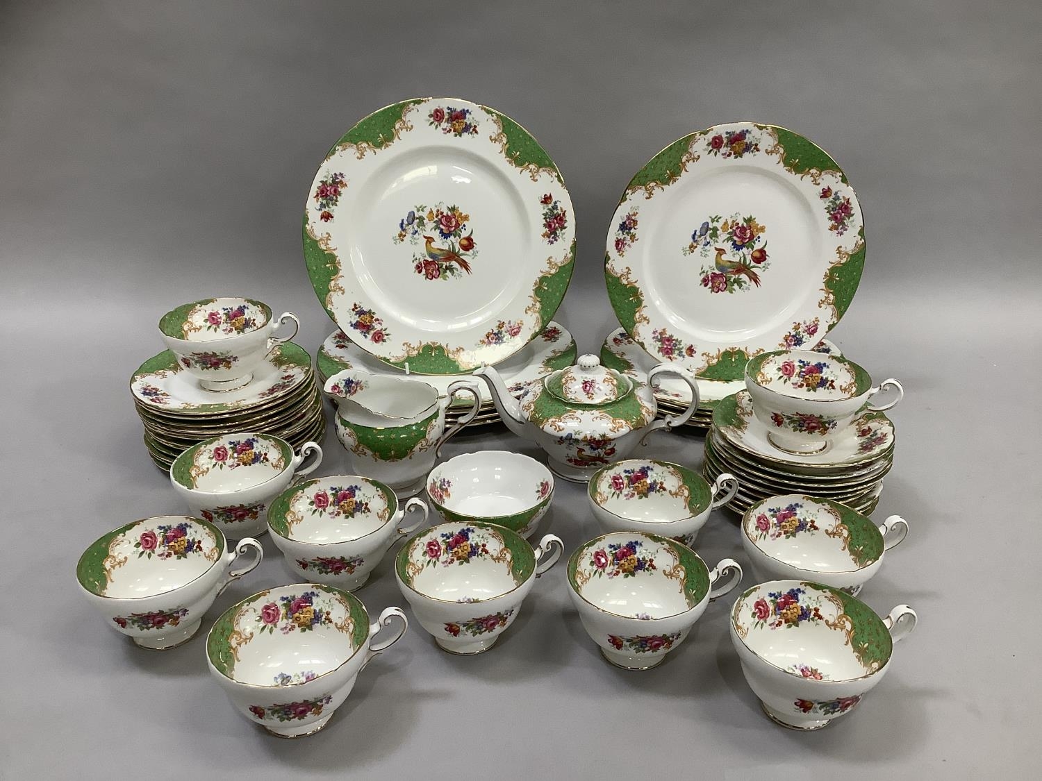 A Paragon Rockingham tea and dinner service comprising eleven cups, ten ...