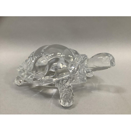 44 - A Waterford glass teddy bear, 7.5cm high, a Swarovski owl, 6cm high, a glass elephant, 5.5cm high, a... 