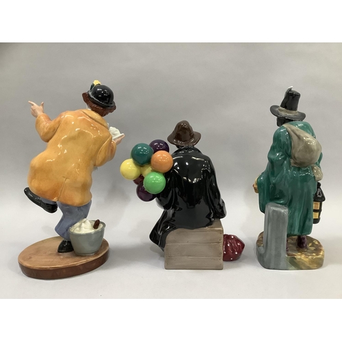 48 - A Royal Doulton figure 'The Mask Seller', number HN2103, 21.5cm high , together with 'The Balloon Ma... 