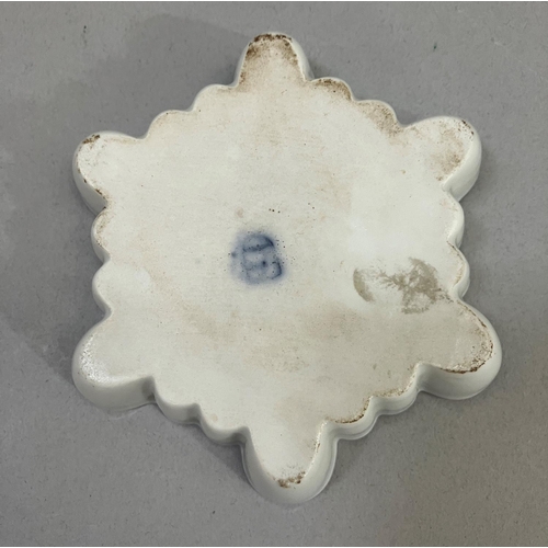 60 - A Vienna porcelain dish of hexagonal scalloped outline painted to the well with travellers and horse... 