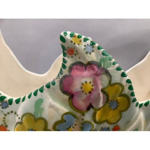 41 - A Beswick flower vase in the form of a basket with loop handle painted in blue, yellow, green, and m... 