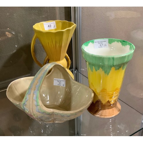 42 - A Beswick vase in green, yellow and brown model number 181, 18cm, an asymmetrical vase in brown over... 