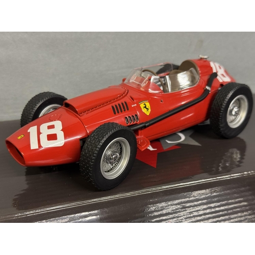 23 - A CMR Classic Model Replicars scale model of the 1958 Phil Hill Ferrari Dino 246 F1, along with a Ho... 