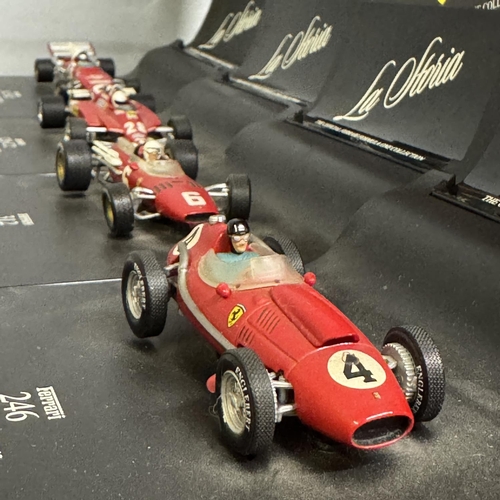 26 - Four Hot Wheels Racing La Storia Ferrari racing cars, including a Ferrari Dino 246, a Ferrari 126 C2... 