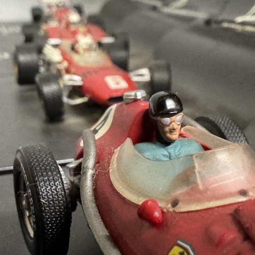 26 - Four Hot Wheels Racing La Storia Ferrari racing cars, including a Ferrari Dino 246, a Ferrari 126 C2... 