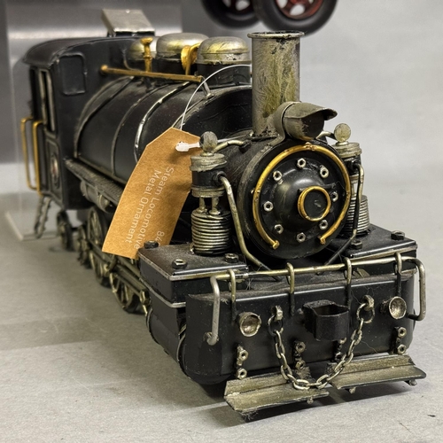 36 - Two detailed modern tin plate models of a 1930s-style fire engine and a turn-of-the-century 0-6-4 st... 