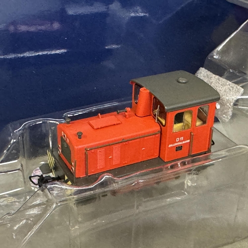 47 - A Hornby Minitrix N Gauge N.101 Goods Set, an N.102 Passenger Set, an N.901 Siding Set and an N.902 ... 