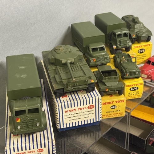 13 - Seven boxed Dinky Toys die-cast army vehicles, including 622 10 Ton Army Truck, 651 Centurion Tank, ... 