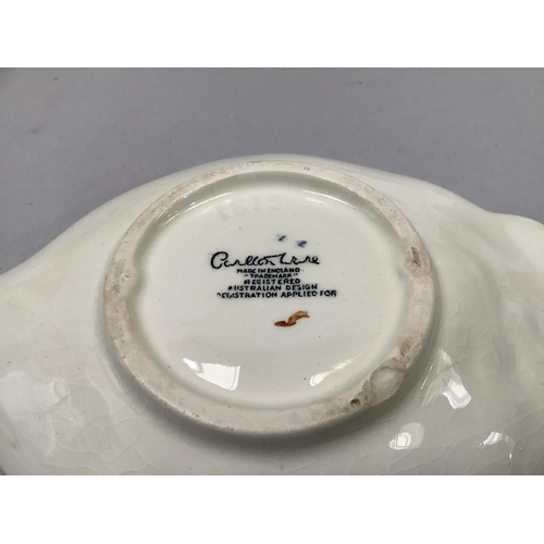 84 - Six items of leaf and flower moulded Carlton ware in yellow and green comprising pedestal dish, trin... 