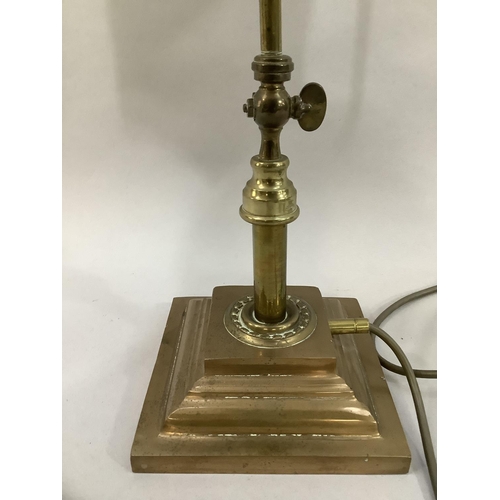 20 - An early 20th century brass and copper table lamp with white marbled glass shade printed in colour w... 