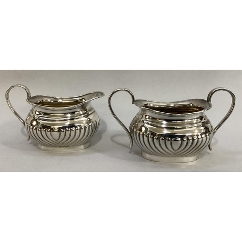 3 - A four piece silver plated tea and coffee service of oval and part reeded form comprising coffee pot... 