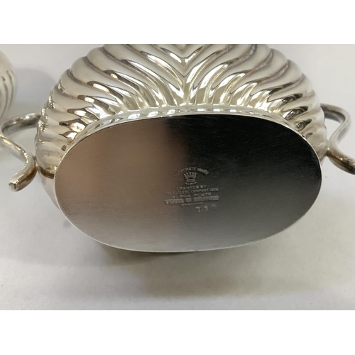 3 - A four piece silver plated tea and coffee service of oval and part reeded form comprising coffee pot... 