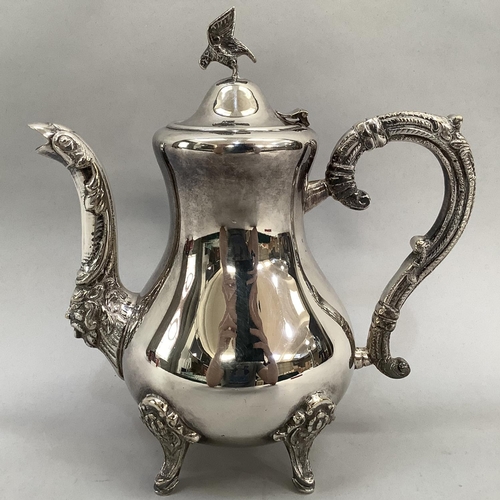 2 - A silver plated coffee pot, baluster form, with eagle finial, foliate C scroll handle, grotesque bir... 