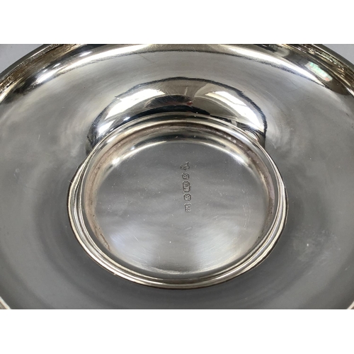 7 - A Victorian silver plated fruit basket with swing handle, chased foliate swing handle and rim, pierc... 
