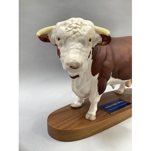 34 - 'Hereford Bull', a Connoisseur model by Beswick, on wooden plinth, 29cm long x 19cm high