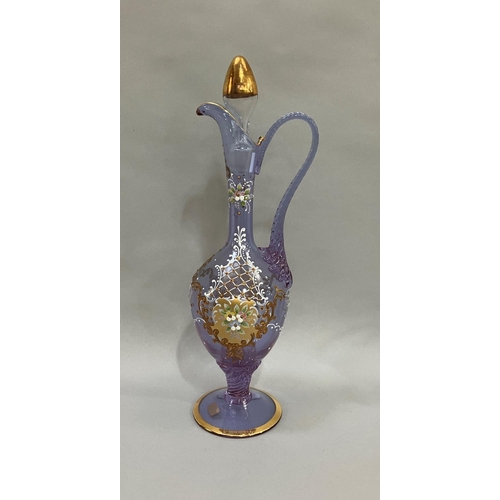 42 - An Italian pale lilac glass wine set comprising claret jug, 40.5cm high, and six goblets each painte... 
