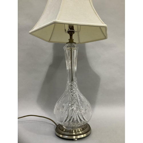 44 - A cut glass table lamp on metal base, 45cm high to the fitting, with shade