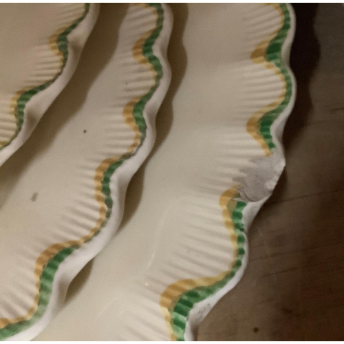 45 - An Adams Titian ware dinner service of Lancaster pattern painted in shades of yellow, green, and fuc... 