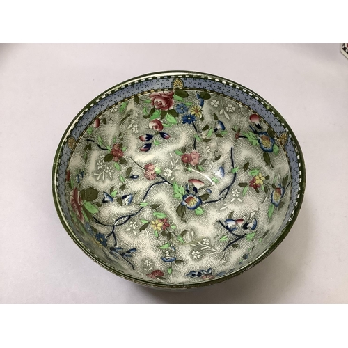 47 - An early 20th century cylinder vase of octagonal form, floral decoration, a Royal Corona ware chintz... 