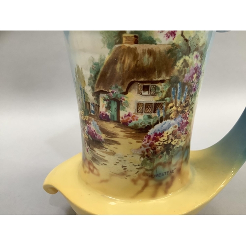 47 - An early 20th century cylinder vase of octagonal form, floral decoration, a Royal Corona ware chintz... 