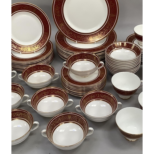 16 - A Royal Doulton bone china Buckingham dinner and tea service comprising ten dinner plates, ten desse... 