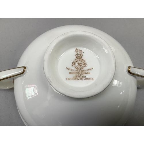 16 - A Royal Doulton bone china Buckingham dinner and tea service comprising ten dinner plates, ten desse... 