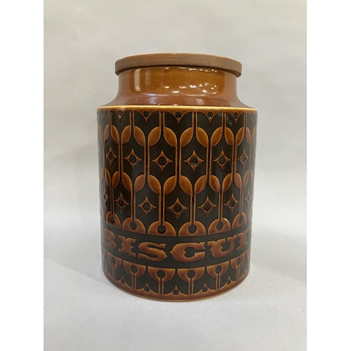 17 - A collection of Hornsea Heirloom pattern storage jars with wooden lids including Biscuits, 20cm high... 