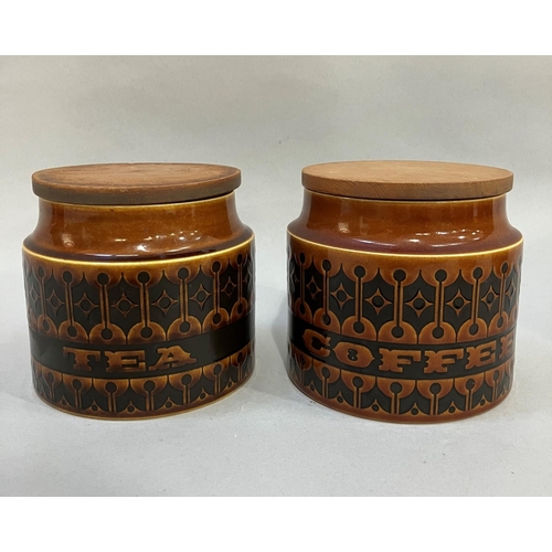 17 - A collection of Hornsea Heirloom pattern storage jars with wooden lids including Biscuits, 20cm high... 