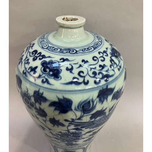 21 - A large Chinese reproduction yuan blue and white meiping vase painted with phoenix amongst peony, 35... 