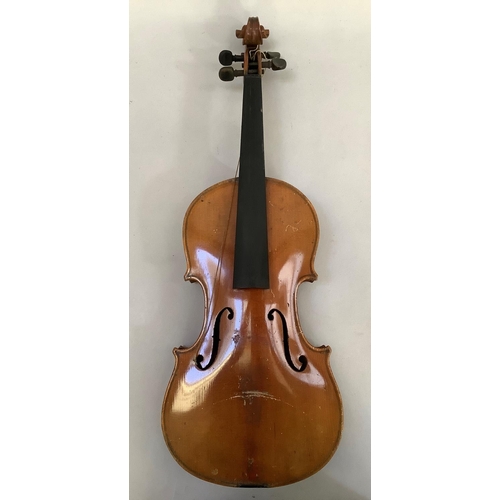 26 - A violin, the label printed 'Copy of Antonius Stradivarius', Made in Czechoslovakia, the back 37cm, ... 