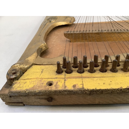 29 - A gilt metal lyre with wooden sound board, named Klingsor, 52cm x 35cm (welded repair to top scrolls... 