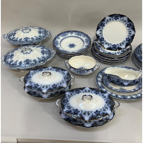 72 - A quantity of blue and white dinner ware by Alfred Meakin of Regent and Countess designs including f... 