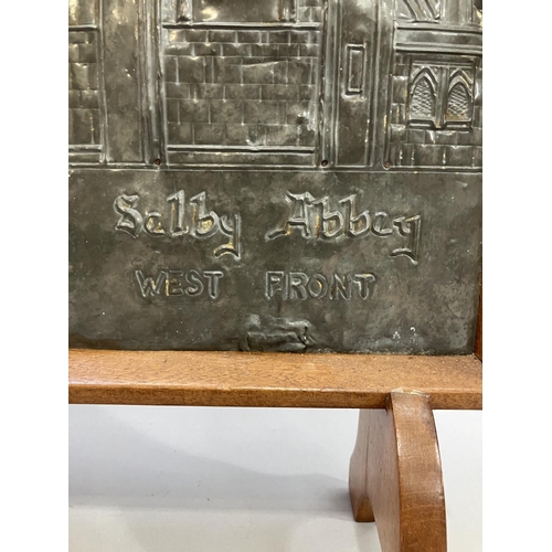 32 - A metal panel, possibly antimony, worked with a view of Selby Abbey West Front by E J Prangnell 1958... 