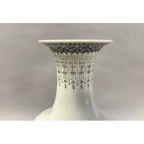 49 - A 20th century Chinese Republic vase painted with rocks issuing peony with birds within printed blac... 