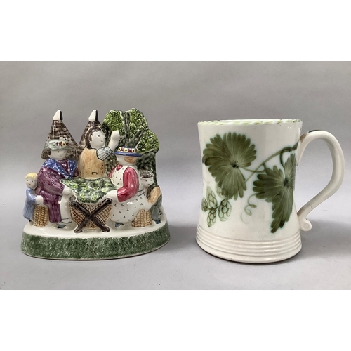 54 - A Rye pottery group of hops pickers with oast houses, initialled LHL to underside, together with a l... 