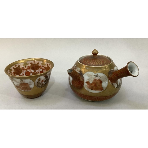 12 - A black ceramic copy of a Chinese terracotta warrior kneeling, 40cm high, (constructed in two pieces... 