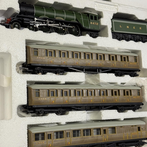 51 - A Hornby R1019 Flying Scotsman electric train set with all accessories including Track Packs A and B... 