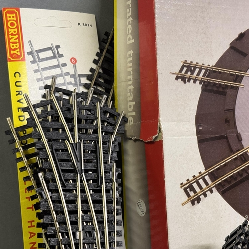 52 - A Hornby R070 Electrically Operated Turntable along with a quantity of track including straights, do... 