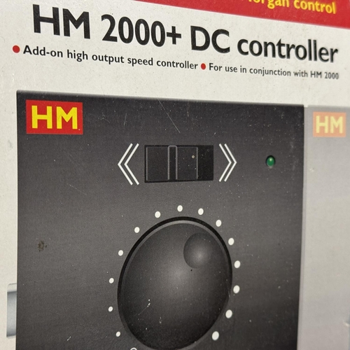 54 - A Hornby Hammant and Morgan HM2000 power controller, along with a Hammant and Morgan HM2000+ slave c... 