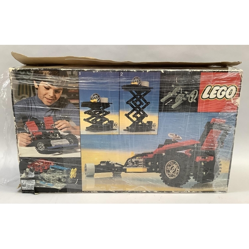 20 - A Lego 8860 model car with rear-mounted engine and working gearbox and differential, along with 870 ... 