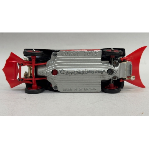 20B - A Corgi Toys die cast model of Chitty Chitty Bang Bang with all passengers, pop out wings and detach... 