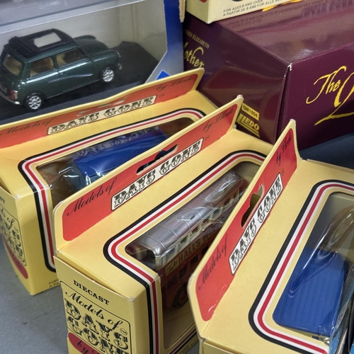 29 - A collection of Lledo Days Gone die-cast models, including The Queen Mother commemorative set, along... 